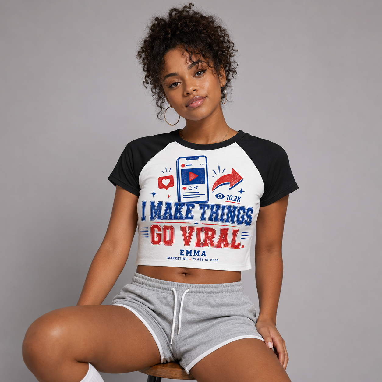 College student modeling I Make Things Go Viral crop tee